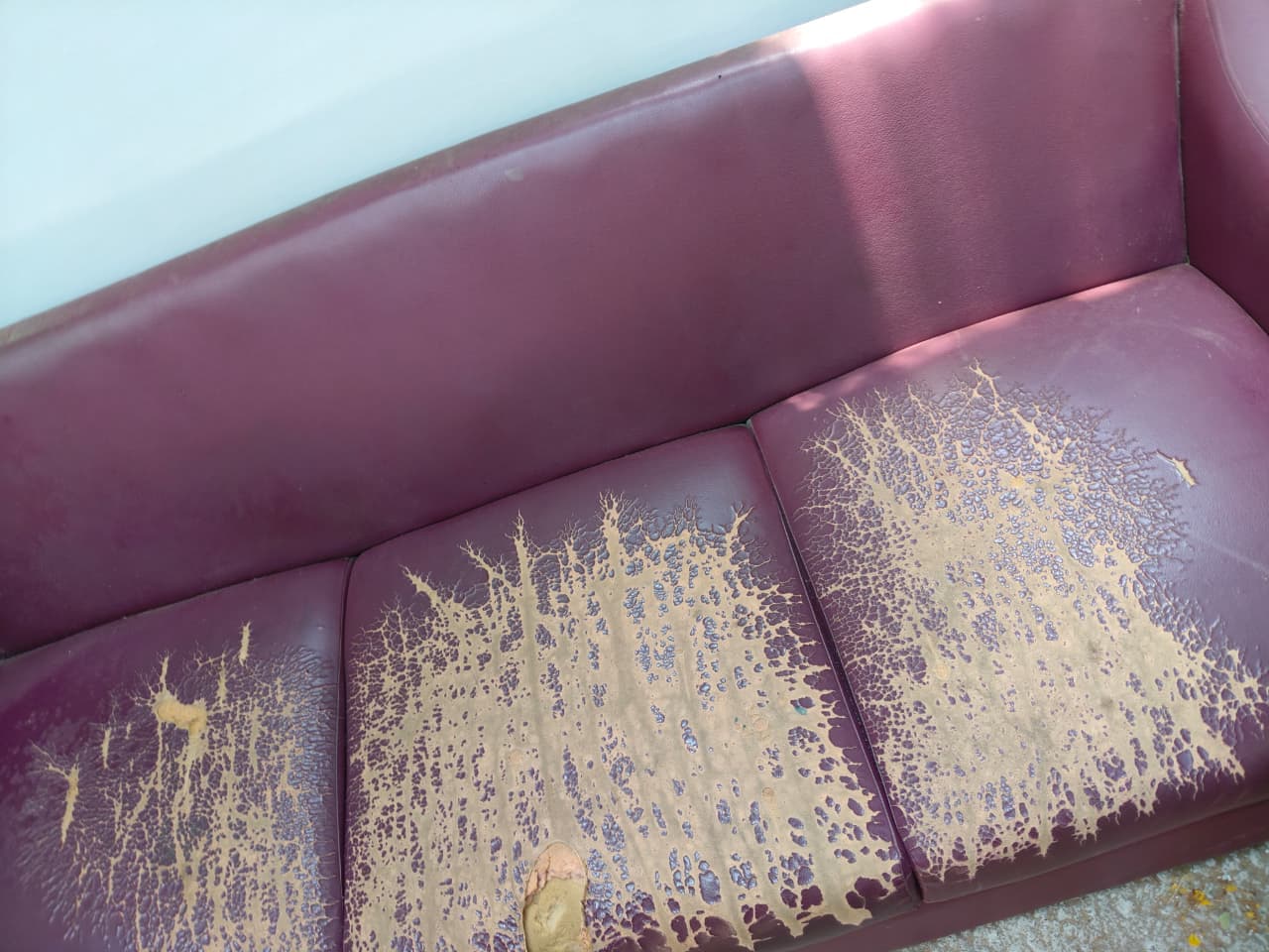 Worn and damaged sofa before professional refurbishment by Everest Foam & Lining, Chennai